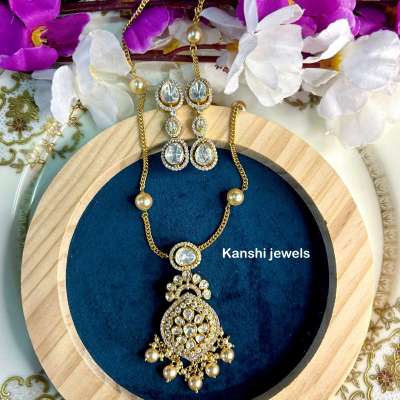 Silver moissanite pendant and earrings Profile Picture